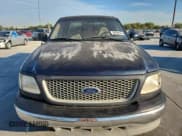 ✅ 1999 Ford F-150 • VIN: 1FTRX17W4XNB72337 • Lot: 86766575. Listed on Copart with 183,712 mi. Free auction sales archive from the USA and detailed vehicle history report at DreamBid. Image 5.