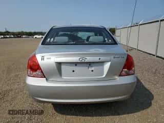 2005 Hyundai Elantra GLS with VIN KMHDN45D25U014113, listed as a Copart auction lot 71258844 with 199,862 mi miles and Salvage title. Bid and sale history available at DreamBid. Image 6.