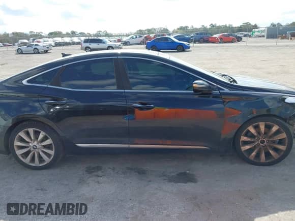 2017 Hyundai Azera Limited z VIN KMHFH4JG8HA591590, wystawiony jako IAAI lot #41542914 z przebiegiem 100 063 mil mil oraz . Historia ofert i sprzedaży dostępna na DreamBid. Obrazek 14.