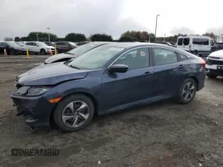 ✅ 2021 Honda Civic LX • VIN: 2HGFC2F65MH557708 • Lot: 92298735. Wystawiony na Copart z przebiegiem 104 002 mil. Bezpłatny archiwum sprzedaży aukcyjnych z USA i szczegółowy raport historii pojazdu na DreamBid. Zdjęcie 1.