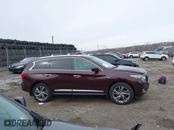 ✅ 2015 Infiniti QX60 • VIN: 5N1AL0MMXFC503644 • Lot: 41614230. Listed on IAAI with 102,368 mi. Free auction sales archive from the USA and detailed vehicle history report at DreamBid. Image 13.