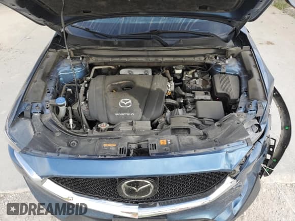 ✅ 2021 Mazda CX-5 Touring • VIN: JM3KFBCM8M1370668 • Lot: 81922665. Wystawiony na Copart z przebiegiem 86 596 mil. Bezpłatny archiwum sprzedaży aukcyjnych z USA i szczegółowy raport historii pojazdu na DreamBid. Zdjęcie 12.