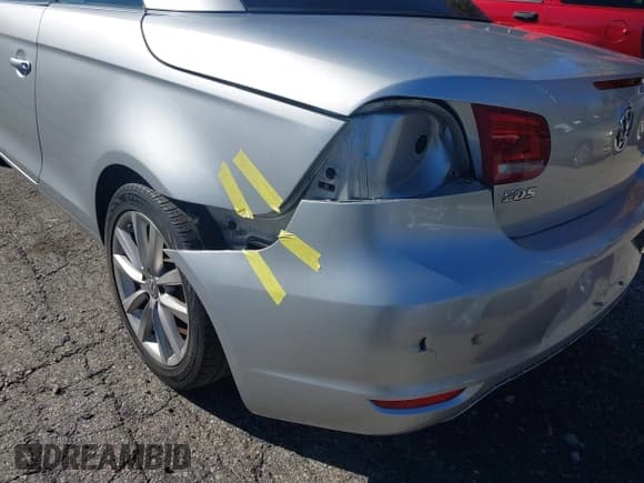 ✅ 2012 Volkswagen Eos Komfort • VIN: WVWBW7AH5CV013113 • Lot: 43471186. Listed on IAAI with 96,961 mi. Free auction sales archive from the USA and detailed vehicle history report at DreamBid. Image 12.