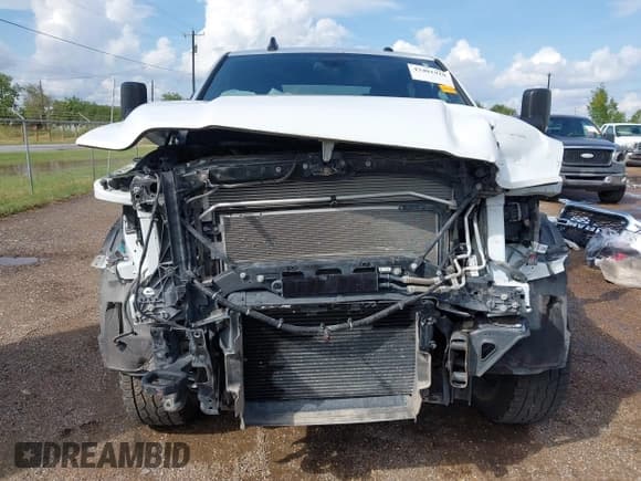 ✅ 2022 Ram 2500 Tradesman • VIN: 3C6UR5HL3NG232329 • Lot: 43401918. Listed on IAAI with 62,187 mi. Free auction sales archive from the USA and detailed vehicle history report at DreamBid. Image 13.