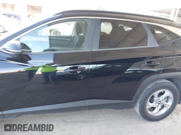 ✅ 2022 Hyundai Tucson SEL • VIN: 5NMJB3AEXNH038613 • Lot: 42853130. Listed on IAAI with 31,258 mi. Free auction sales archive from the USA and detailed vehicle history report at DreamBid. Image 14.
