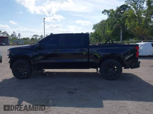 2023 Chevrolet Silverado 1500 RST with VIN 2GCPADED5P1154457, listed as a IAAI auction lot 42147912 with 12,153 mi miles and . Bid and sale history available at DreamBid. Image 15.