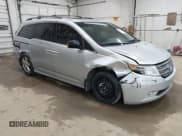 ✅ 2012 Honda Odyssey Touring • VIN: 5FNRL5H99CB052361 • Lot: 42332298. Listed on IAAI with 185,914 mi. Free auction sales archive from the USA and detailed vehicle history report at DreamBid. Image 1.