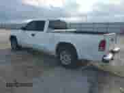 2002 Dodge Dakota SLT с VIN 1B7GL42N72S593692, выставлен на аукционе Copart как лот 69221245 с пробегом 141 599 миль миль и Списание • Salvage title. История ставок и продаж доступна на DreamBid. Изображение 2.