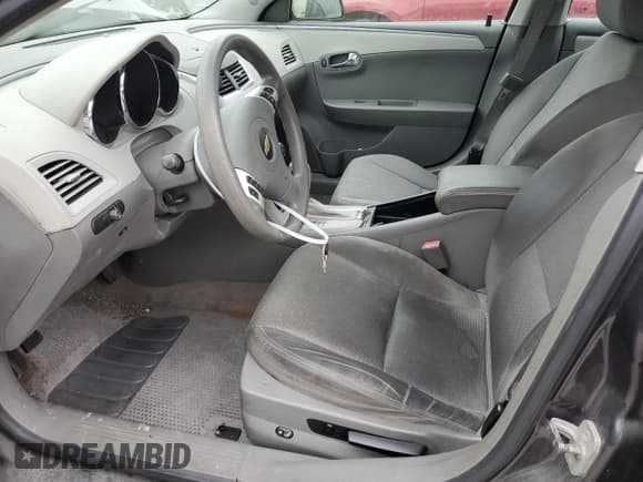 ✅ 2012 Chevrolet Malibu 1LS • VIN: 1G1ZB5E06CF352369 • Lot: 75532834. Listed on Copart with 96,259 mi. Free auction sales archive from the USA and detailed vehicle history report at DreamBid. Image 7.