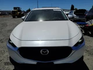 ✅ 2020 Mazda CX-30 Premium • VIN: 3MVDMBEM1LM132522 • Lot: 60744914. Wystawiony na Copart z przebiegiem 30 308 mil. Bezpłatny archiwum sprzedaży aukcyjnych z USA i szczegółowy raport historii pojazdu na DreamBid. Zdjęcie 5.