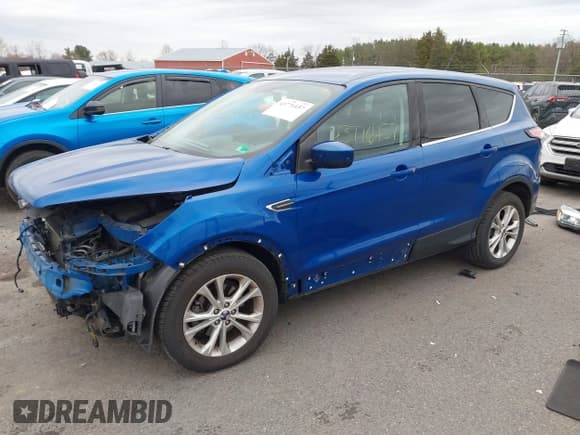 ✅ 2017 Ford Escape SE • VIN: 1FMCU0GD5HUA58227 • Lot: 43776457. Listed on IAAI with 104,921 mi. Free auction sales archive from the USA and detailed vehicle history report at DreamBid. Image 18.