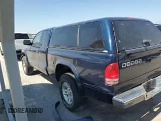 2001 Dodge Dakota Sport z VIN 1B7GG22N01S270009, wystawiony jako Copart lot #70438494 z przebiegiem Nie podano mil oraz Szkoda całkowita • Salvage title. Historia ofert i sprzedaży dostępna na DreamBid. Obrazek 2.