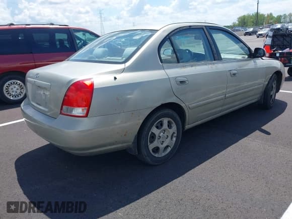 ✅ 2003 Hyundai Elantra GLS • VIN: KMHDN45D83U514659 • Lot: 42016920. Listed on IAAI with 125,673 mi. Free auction sales archive from the USA and detailed vehicle history report at DreamBid. Image 4.