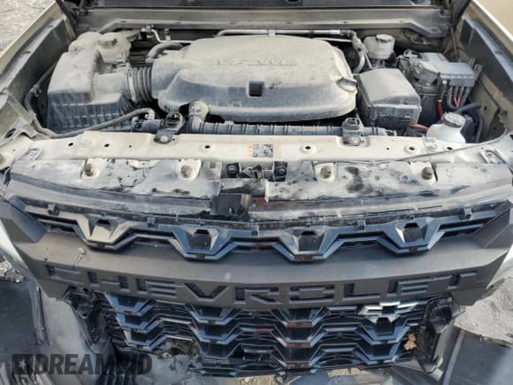 ✅ 2021 Chevrolet Colorado 4WD ZR2 • VIN: 1GCRTEEN2M1187631 • Лот: 82909564. Опубликован ранее на Copart с пробегом 52 950 миль. Бесплатный доступ к архиву аукционных продаж из США и подробный отчёт об истории автомобиля на DreamBid. Изображение 11.