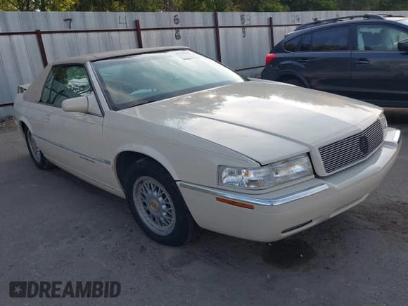 ✅ 1997 Cadillac Eldorado • VIN: 1G6EL12Y9VU611878 • Lot: 43130623. Wystawiony na IAAI z przebiegiem 73 335 mil. Bezpłatny archiwum sprzedaży aukcyjnych z USA i szczegółowy raport historii pojazdu na DreamBid. Zdjęcie 1.