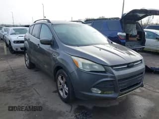 ✅ 2014 Ford Escape SE • VIN: 1FMCU9GX4EUC70031 • Lot: 43725499. Listed on IAAI with 134,998 mi. Free auction sales archive from the USA and detailed vehicle history report at DreamBid. Image 1.