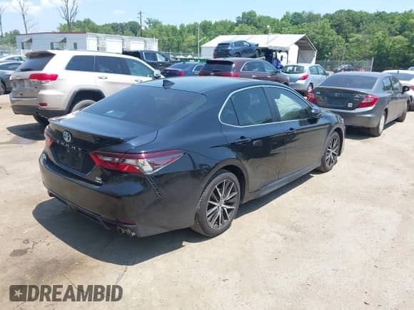 2021 Toyota Camry SE with VIN 4T1G11BK6MU036852, listed as a IAAI auction lot 42590115 with 79,752 mi miles and . Bid and sale history available at DreamBid. Image 4.
