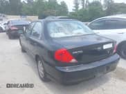 ✅ 2003 Kia Spectra • VIN: KNAFB121535246949 • Lot: 42402307. Listed on IAAI with 98,678 mi. Free auction sales archive from the USA and detailed vehicle history report at DreamBid. Image 3.