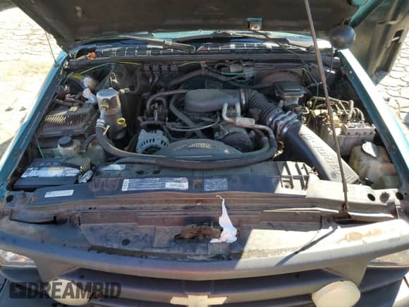 1996 Chevrolet S-10 LS с VIN 1GCCS19X0TK118541, выставлен на аукционе Copart как лот 73422574 с пробегом 268 623 миль миль и Списание • Salvage title. История ставок и продаж доступна на DreamBid. Изображение 11.