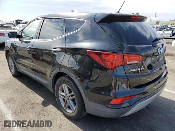 ✅ 2018 Hyundai Santa Fe 2.4L • VIN: 5NMZT3LB6JH098160 • Лот: 65944304. Опубликован ранее на Copart с пробегом 101 051 миль. Бесплатный доступ к архиву аукционных продаж из США и подробный отчёт об истории автомобиля на DreamBid. Изображение 2.