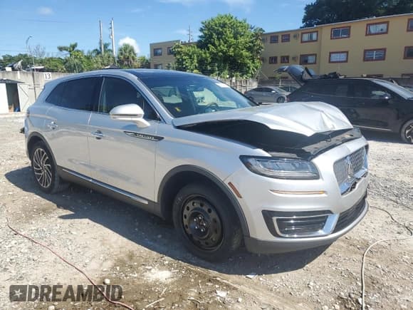 ✅ 2019 Lincoln Nautilus Reserve • VIN: 2LMPJ6LP1KBL50990 • Lot: 69210645. Listed on Copart with 65,309 mi. Free auction sales archive from the USA and detailed vehicle history report at DreamBid. Image 4.