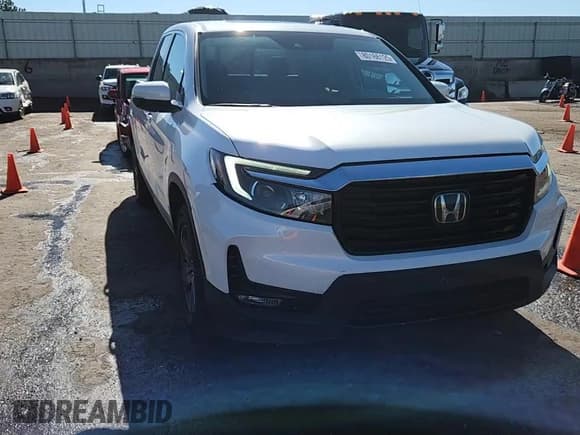 ✅ 2023 Honda Ridgeline RTL-E • VIN: 5FPYK3F75PB002011 • Lot: 80166125. Listed on Copart with 29,143 mi. Free auction sales archive from the USA and detailed vehicle history report at DreamBid. Image 13.