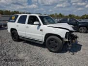 ✅ 2004 Chevrolet Tahoe LT • VIN: 1GNEC13Z64R233564 • Lot: 82150225. Listed on Copart with 310,989 mi. Free auction sales archive from the USA and detailed vehicle history report at DreamBid. Image 4.