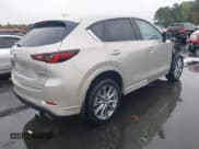 ✅ 2024 Mazda CX-5 S Premium • VIN: JM3KFBDL4R0488834 • Lot: 43328370. Listed on IAAI with 15,395 mi. Free auction sales archive from the USA and detailed vehicle history report at DreamBid. Image 4.