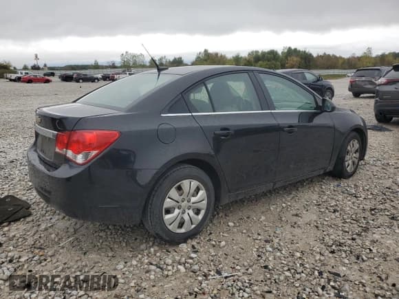 ✅ 2012 Chevrolet Cruze LS • VIN: 1G1PC5SHXC7257306 • Lot: 85711255. Listed on Copart with 223,443 mi. Free auction sales archive from the USA and detailed vehicle history report at DreamBid. Image 3.