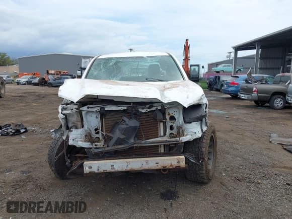 ✅ 2017 Toyota Tacoma SR • VIN: 5TFRX5GN8HX077669 • Лот: 41949088. Опубликован ранее на IAAI с пробегом 110 454 миль. Бесплатный доступ к архиву аукционных продаж из США и подробный отчёт об истории автомобиля на DreamBid. Изображение 13.