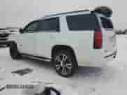 2020 Chevrolet Tahoe Premier with VIN 1GNSKCKJXLR182971, listed as a Copart auction lot 87268634 with 210,000 mi miles and Salvage title. Bid and sale history available at DreamBid. Image 2.