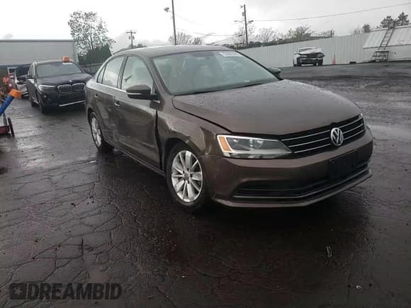 ✅ 2015 Volkswagen Jetta SE • VIN: 3VWD17AJ1FM422960 • Lot: 55860335. Listed on Copart with 87,616 mi. Free auction sales archive from the USA and detailed vehicle history report at DreamBid. Image 13.