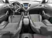 2015 Hyundai Veloster с VIN KMHTC6AD6FU233421, выставлен на аукционе Copart как лот 66420264 с пробегом 99 273 миль миль и Списание • Salvage title. История ставок и продаж доступна на DreamBid. Изображение 8.