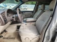 ✅ 2006 Buick Rendezvous • VIN: 3G5DA03L56S515167 • Lot: 82384945. Wystawiony na Copart z przebiegiem 240 864 mil. Bezpłatny archiwum sprzedaży aukcyjnych z USA i szczegółowy raport historii pojazdu na DreamBid. Zdjęcie 7.