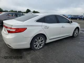 ✅ 2013 Hyundai Azera • VIN: KMHFG4JG8DA228669 • Лот: 62734185. Опубликован ранее на Copart с пробегом 148 611 миль. Бесплатный доступ к архиву аукционных продаж из США и подробный отчёт об истории автомобиля на DreamBid. Изображение 3.