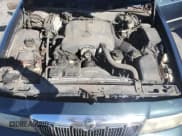 ✅ 1999 Mercury Grand Marquis GS • VIN: 2MEFM74W3XX673624 • Лот: 84954145. Опубликован ранее на Copart с пробегом 203 868 миль. Бесплатный доступ к архиву аукционных продаж из США и подробный отчёт об истории автомобиля на DreamBid. Изображение 11.