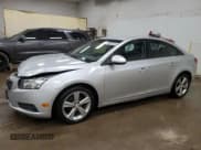 ✅ 2014 Chevrolet Cruze 2LT • VIN: 1G1PE5SB0E7409408 • Lot: 86823525. Listed on Copart with 203,056 mi. Free auction sales archive from the USA and detailed vehicle history report at DreamBid. Image 1.