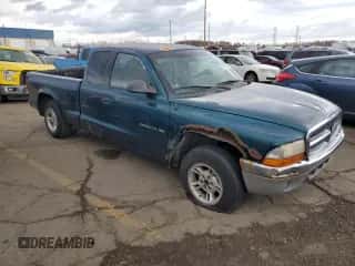 1999 Dodge Dakota SLT z VIN 1B7GG22Y5XS119136, wystawiony jako Copart lot #79797774 z przebiegiem 278 120 mil mil oraz Czysty tytuł • Clean title. Historia ofert i sprzedaży dostępna na DreamBid. Obrazek 4.