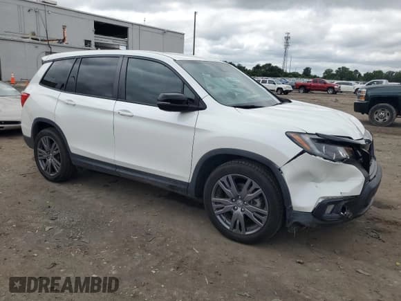 ✅ 2021 Honda Passport EX-L • VIN: 5FNYF7H58MB014097 • Lot: 69596985. Listed on Copart with 41,048 mi. Free auction sales archive from the USA and detailed vehicle history report at DreamBid. Image 4.