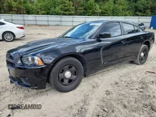 ✅ 2013 Dodge Charger Police • VIN: 2C3CDXAG1DH670569 • Lot: 84860955. Listed on Copart with 111,155 mi. Free auction sales archive from the USA and detailed vehicle history report at DreamBid. Image 1.