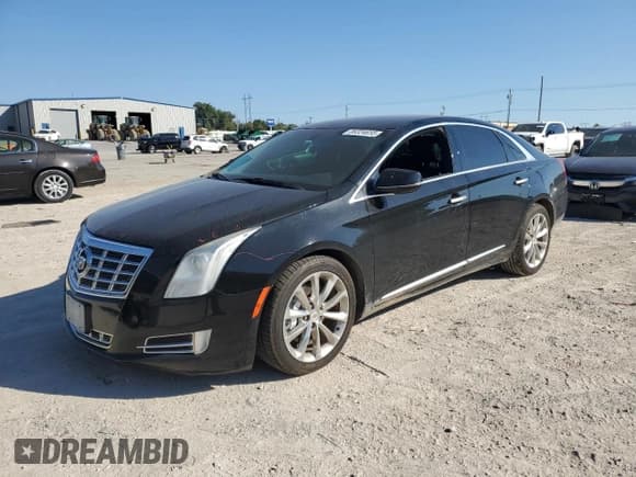 ✅ 2014 Cadillac XTS Luxury • VIN: 2G61N5S33E9271239 • Lot: 86324655. Wystawiony na Copart z przebiegiem 143 493 mil. Bezpłatny archiwum sprzedaży aukcyjnych z USA i szczegółowy raport historii pojazdu na DreamBid. Zdjęcie 1.