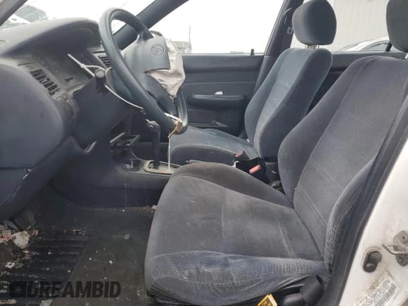 ✅ 1993 Toyota Corolla DLX • VIN: 1NXAE09E3PZ084818 • Lot: 83915434. Wystawiony na Copart z przebiegiem 247 850 mil. Bezpłatny archiwum sprzedaży aukcyjnych z USA i szczegółowy raport historii pojazdu na DreamBid. Zdjęcie 7.