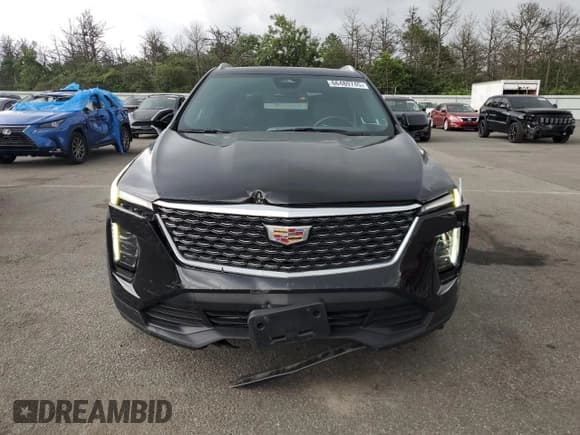 ✅ 2024 Cadillac XT4 AWD Luxury • VIN: 1GYFZBR43RF203549 • Лот: 66489745. Опубликован ранее на Copart с пробегом 11 279 миль. Бесплатный доступ к архиву аукционных продаж из США и подробный отчёт об истории автомобиля на DreamBid. Изображение 5.