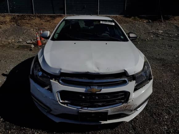 2015 Chevrolet Cruze LS z VIN 1G1PA5SG8F7290645, wystawiony jako Copart lot #83963235 z przebiegiem 110 216 mil mil oraz Szkoda całkowita • Salvage title. Historia ofert i sprzedaży dostępna na DreamBid. Obrazek 5.