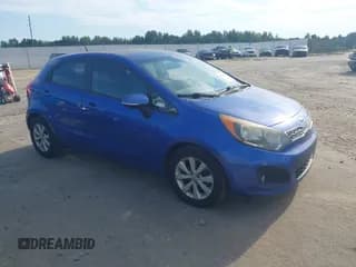 ✅ 2013 Kia Rio SX • VIN: KNADN5A30D6157018 • Lot: 42834226. Listed on IAAI with 132,885 mi. Free auction sales archive from the USA and detailed vehicle history report at DreamBid. Image 1.