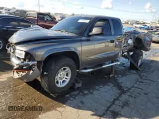 2003 Dodge Dakota SLT с VIN 1D7HG42N93S363166, выставлен на аукционе Copart как лот 72176534 с пробегом 189 834 миль миль и Списание • Salvage title. История ставок и продаж доступна на DreamBid. Изображение 1.