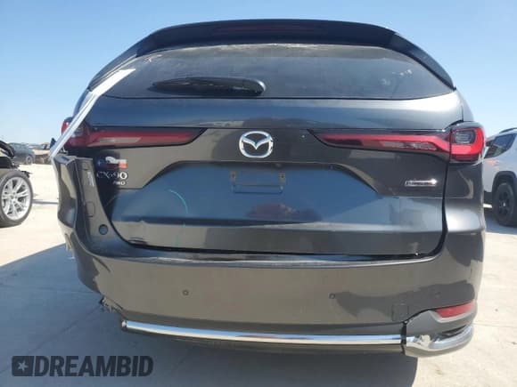 ✅ 2024 Mazda CX-90 S Premium • VIN: JM3KKDHC5R1105723 • Lot: 58151224. Wystawiony na Copart z przebiegiem 7 127 mil. Bezpłatny archiwum sprzedaży aukcyjnych z USA i szczegółowy raport historii pojazdu na DreamBid. Zdjęcie 6.