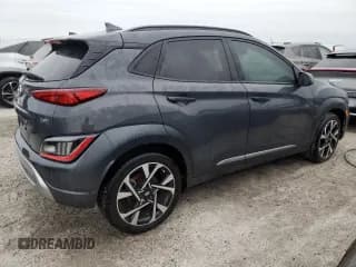 ✅ 2023 Hyundai Kona Limited • VIN: KM8K53A38PU988728 • Лот: 75101634. Опубликован ранее на Copart с пробегом 21 559 миль. Бесплатный доступ к архиву аукционных продаж из США и подробный отчёт об истории автомобиля на DreamBid. Изображение 3.