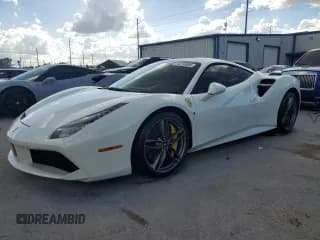 ✅ 2016 Ferrari 488 • VIN: ZFF79ALAXG0216223 • Лот: 74210804. Опубликован ранее на Copart с пробегом Не указан. Бесплатный доступ к архиву аукционных продаж из США и подробный отчёт об истории автомобиля на DreamBid. Изображение 1.