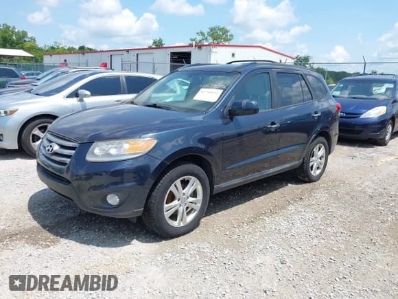 ✅ 2012 Hyundai Santa Fe Limited • VIN: 5XYZK4AG8CG164597 • Лот: 42795932. Опубликован ранее на IAAI с пробегом 197 405 миль. Бесплатный доступ к архиву аукционных продаж из США и подробный отчёт об истории автомобиля на DreamBid. Изображение 2.